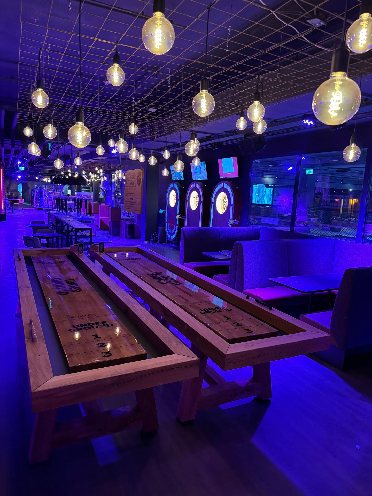 Underground Entertainment Center using Shuffly shuffleboard